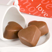 Three heart-shaped chocolates